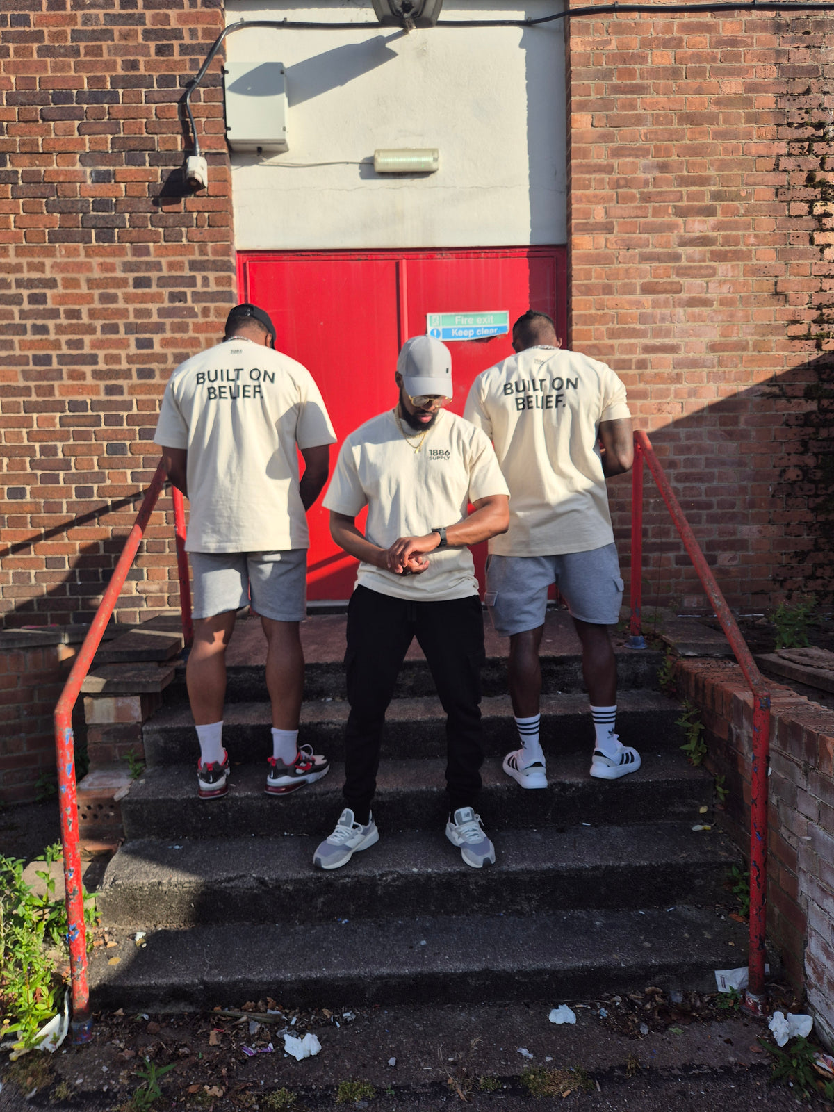 BUILT ON BELIEF T-SHIRT — OFF WHITE