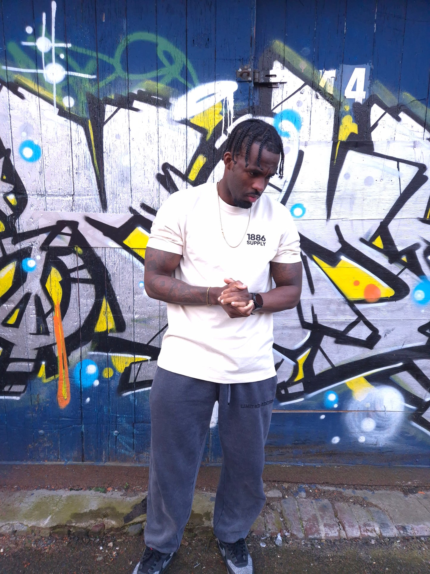 BUILT ON BELIEF T-SHIRT — OFF WHITE